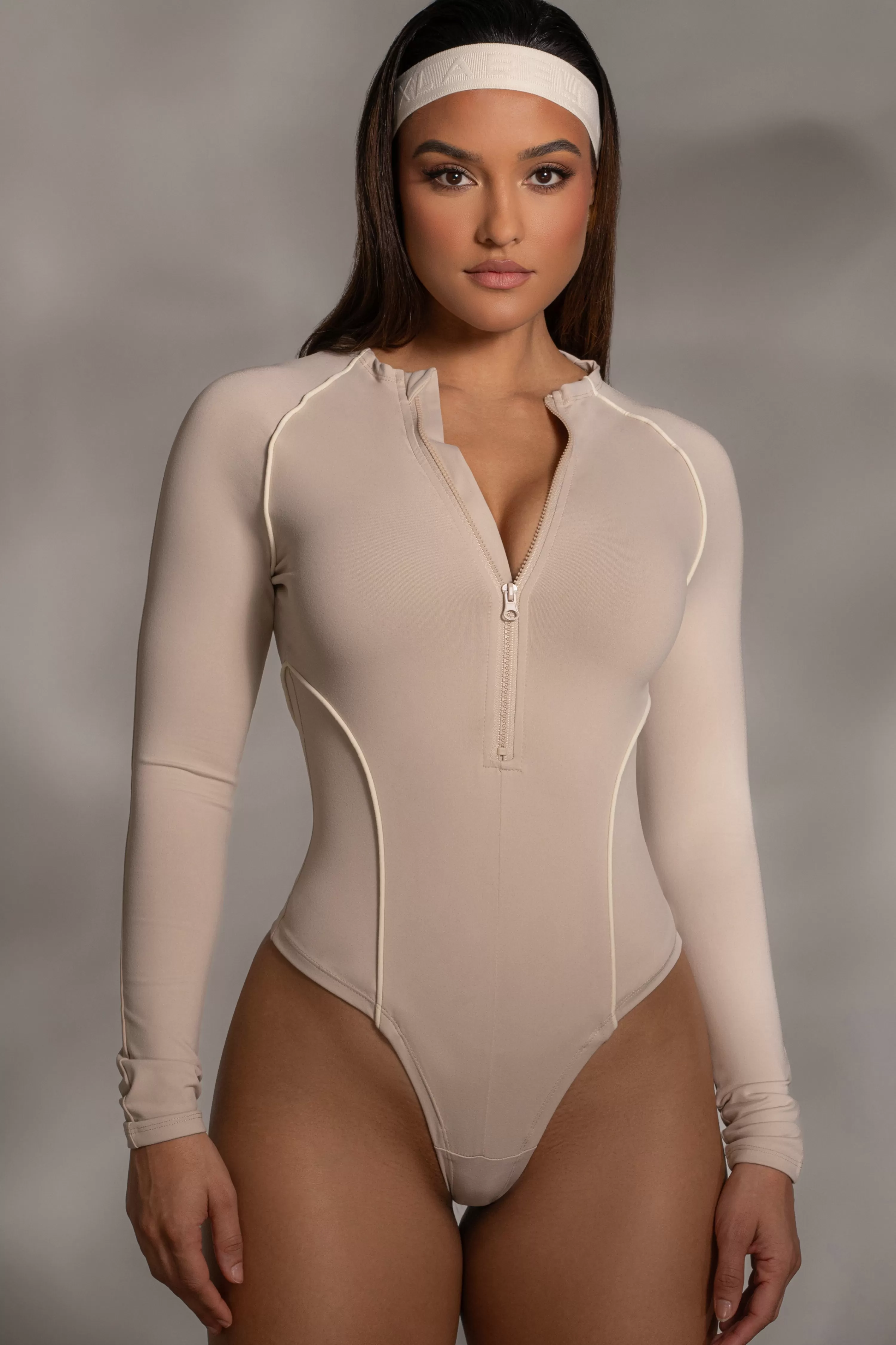 JLUXLABEL Beige Rise Up Zip Front Bodysuit